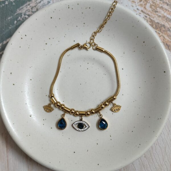18K gold plated evil eye charm bracelet with blue crystal teardrops for women tipsy looks