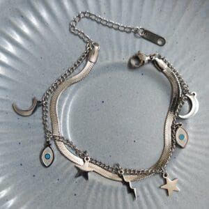 Anti-tarnish silver layered celestial charm bracelet with evil eye moon and stars for women tipsy looks