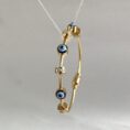 Nazar Evil Eye Twisted Cable Bangle Bracelet - 18K Gold Plated - Tipsy Looks