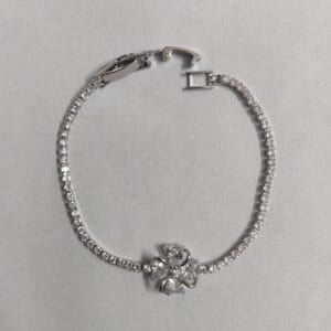 Silver anti-tarnish crystal tennis bracelet with cubic zirconia clover centerpiece for women tipsy looks