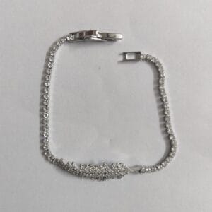 Silver anti-tarnish crystal tennis bracelet with cubic zirconia feather motif for women tipsy looks