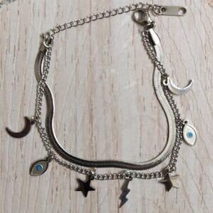 Anti-tarnish silver layered celestial charm bracelet with evil eye moon and stars for women tipsy looks
