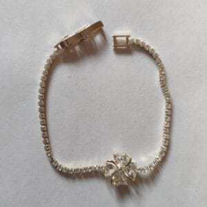 18K gold plated crystal tennis bracelet with cubic zirconia clover centerpiece for women tipsy looks